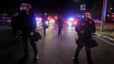 Demonstrators gather outside City Hall to protest the police shooting of Stephon Clark, in Sacramento, California, U.S., March 30, 2018. 