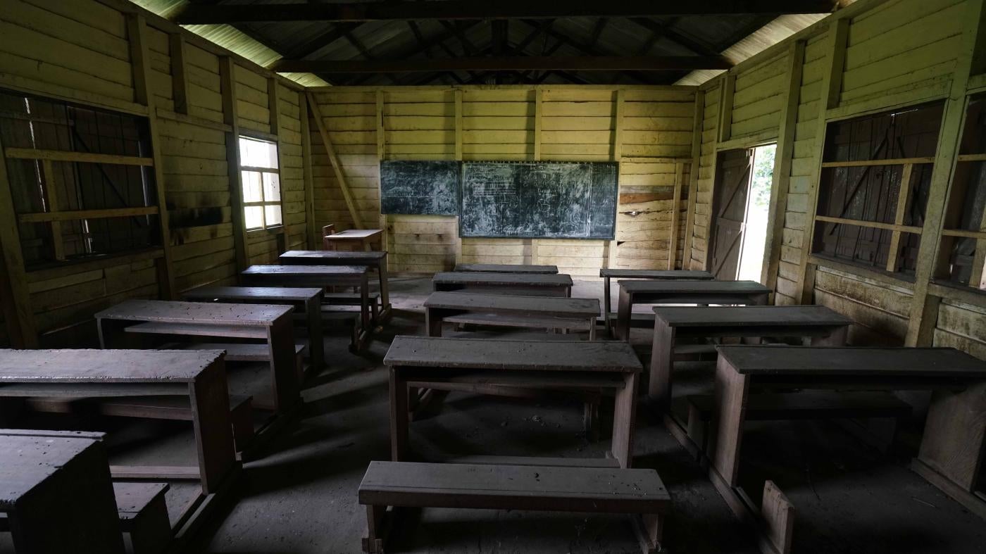 Desks in an empty classroom 