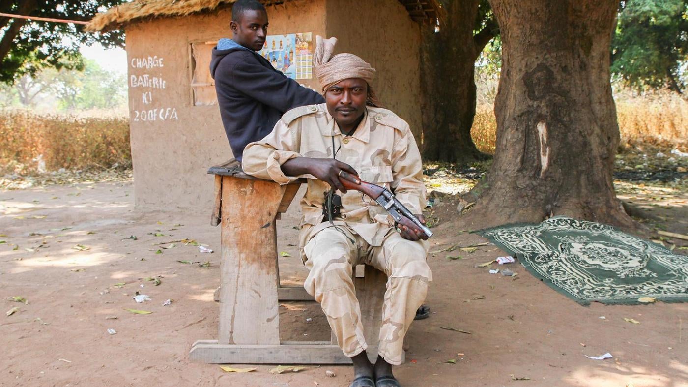 Seleka MPC fighters at a roadblock in Bojomo, Ouham province, with a desk they removed from the local school. 