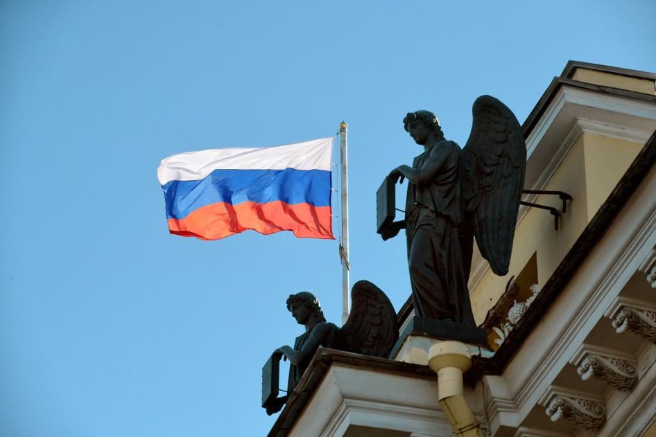 The Russian flag flies on a courthouse building in St. Petersburg, Russia, March 15 2020.