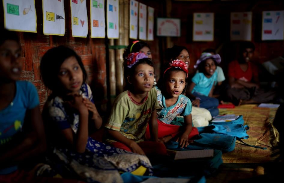 Rohingya refugee children attend a UNICEF run school in Balukhali refugee camp, Bangladesh, August 27, 2018. 