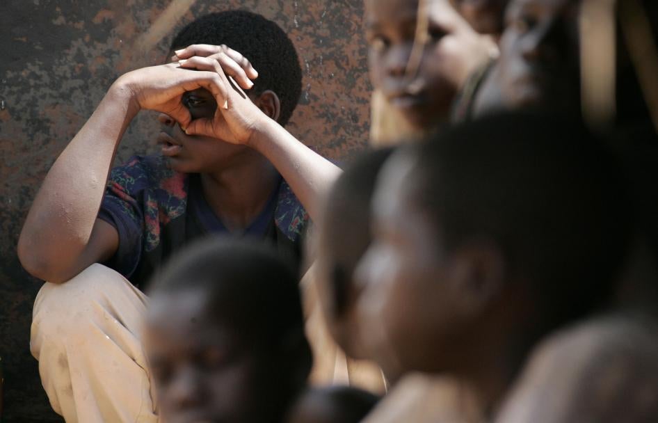 Former child soldier Patrick sits in front of a hut in a refugee camp near Gulu, Uganda in May 2007.
