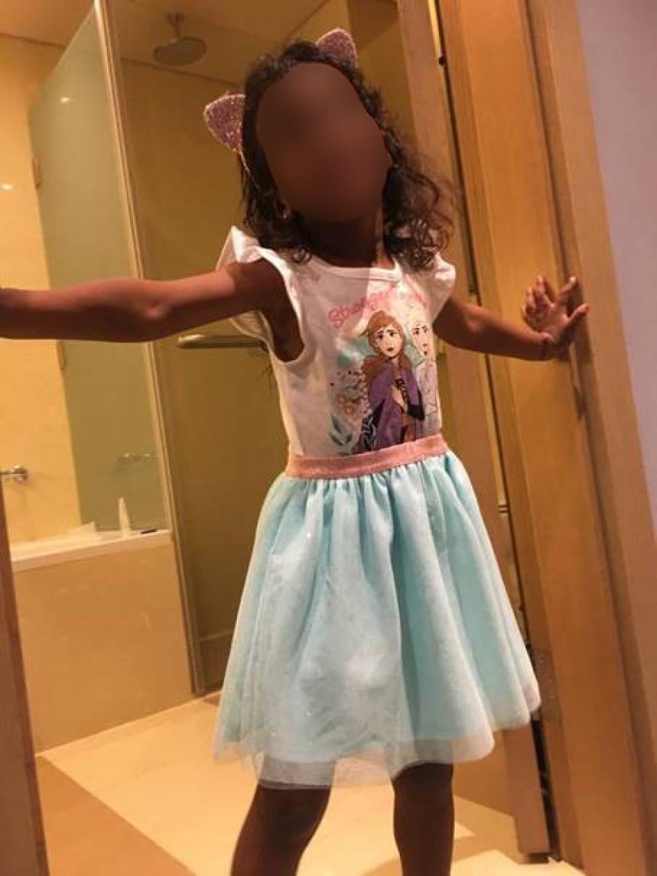 A 4-year-old Canadian girl after her rescue from a detention camp