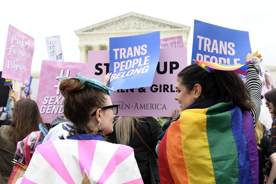 Protesters gather outside the Supreme Court in Washington, DC on Oct. 8, 2019. 