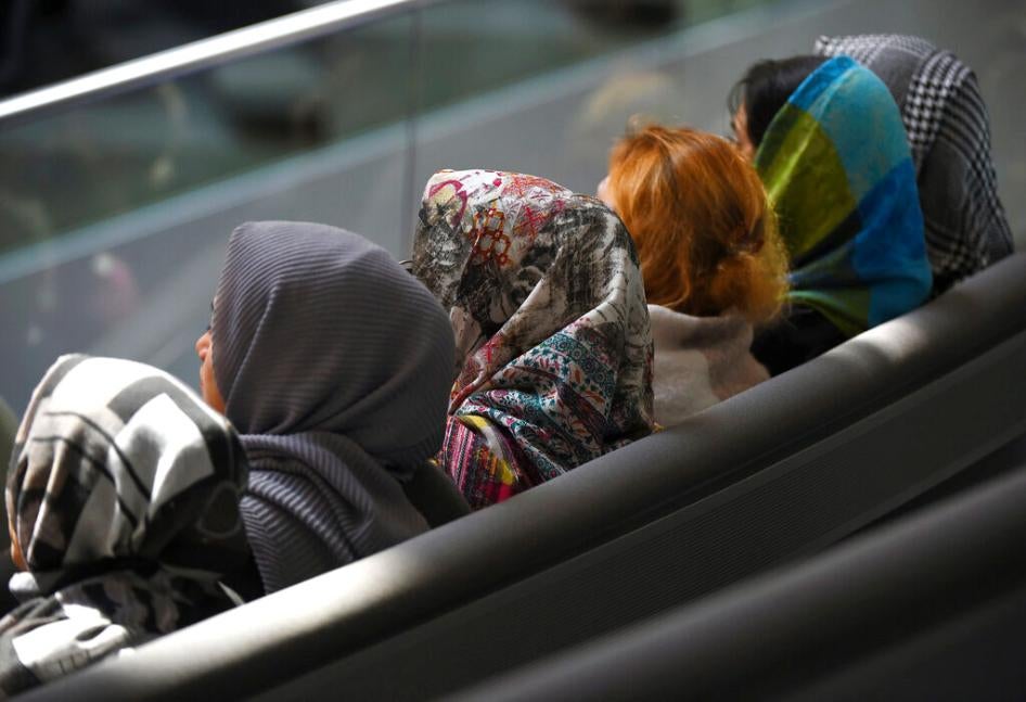 Young women with headscarves sit in the Bundestag in Berlin, Germany on January 31, 2020. 