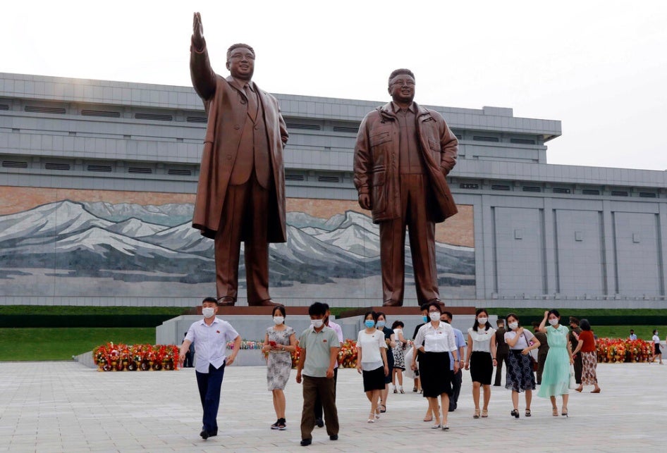 Visitors pay homage to the late North Korean leaders Kim Il Sung and Kim Jong Il ahead of the 27th anniversary of the death of Kim Il Sung, in Pyongyang, North Korea, on July 7, 2021. 
