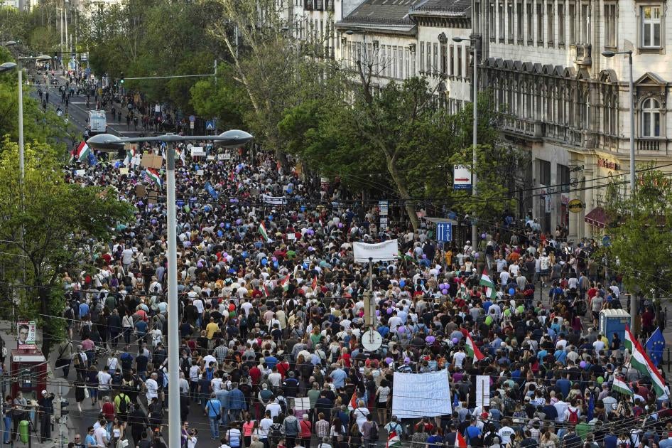 Thousands of people take part in a rally against the Hungarian government's distorting media policies and campaign against civic groups.