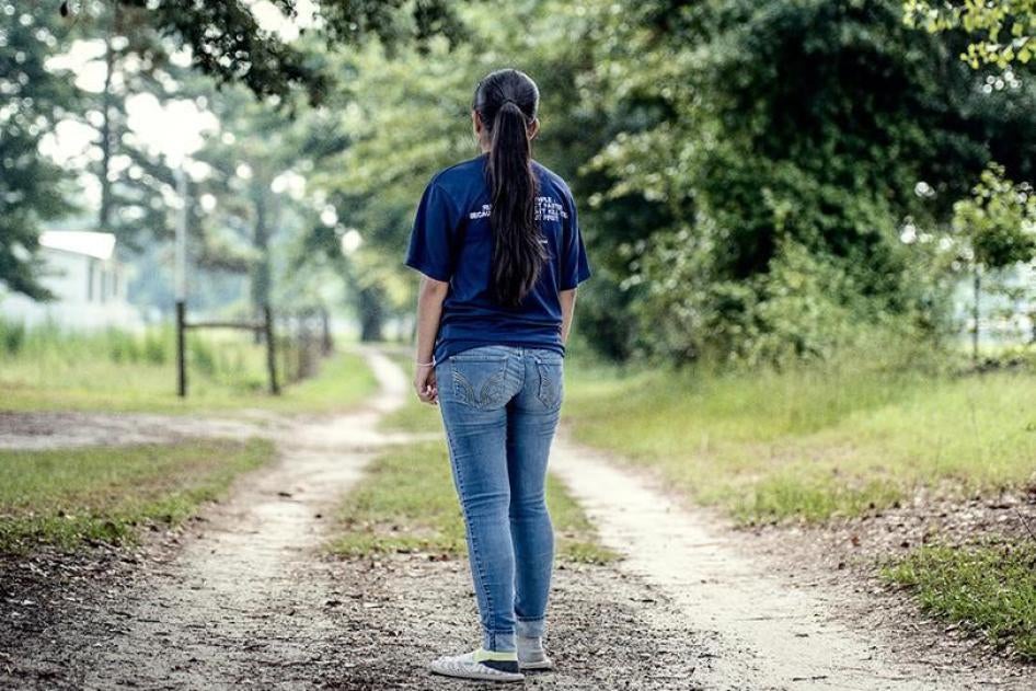 17-year-old tobacco worker on a dirt road 