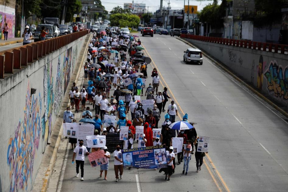 People participate in a protest to demand the release of their relatives who were detained during the government's state of emergency, in San Salvador, El Salvador August 9, 2022.