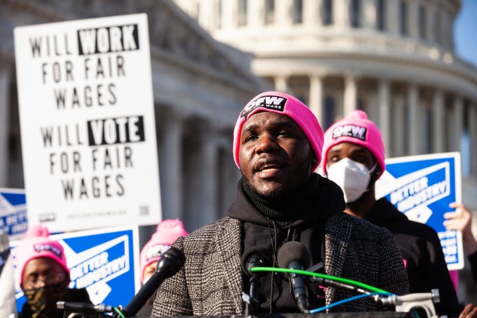 Restaurant worker speaks during a press conference calling on Congress to abolish minimum way for tipped workers in Washington DC. 