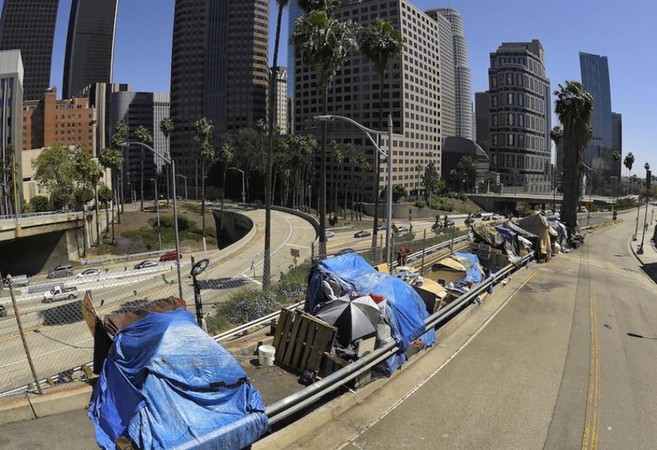 An encampment on Beaudry Avenue along Interstate 110 in downtown Los Angeles.