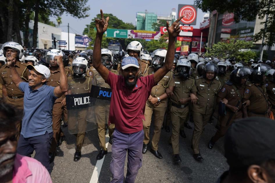 A protestor shouts against the detention of two student leaders in Sri Lanka.