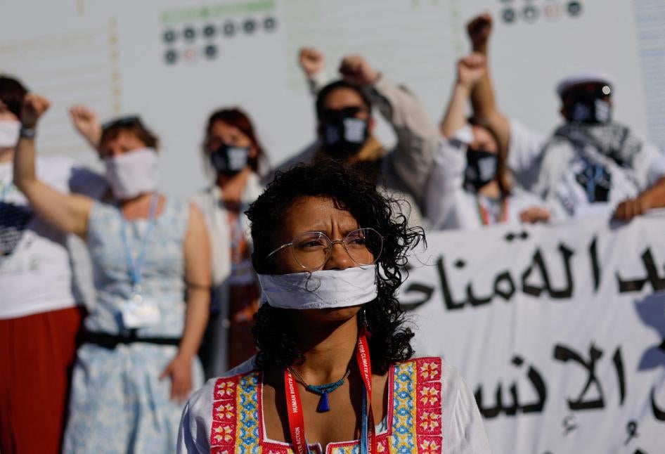 COP Civic Space coalition members protest in solidarity with Egyptian political prisoners during the COP27 climate summit, Sharm el-Sheikh, Egypt, November 10, 2022. 