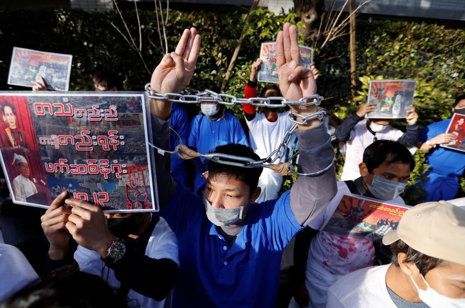 A Myanmar protester raises three-finger salutes during a rally to mark the second anniversary of Myanmar's 2021 military coup, outside Myanmar’s embassy in Tokyo, Japan.