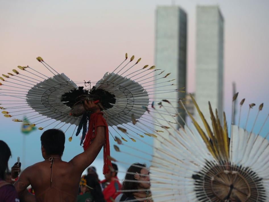 Indigenous peoples demonstrate in front of Brazil's Congress to call for greater protection of their land rights at the Free Land Camp ("Acampamento Terra Livre," in Portuguese) in Brasília, an annual protest held by Indigenous peoples from throughout Brazil, on April 26, 2023.