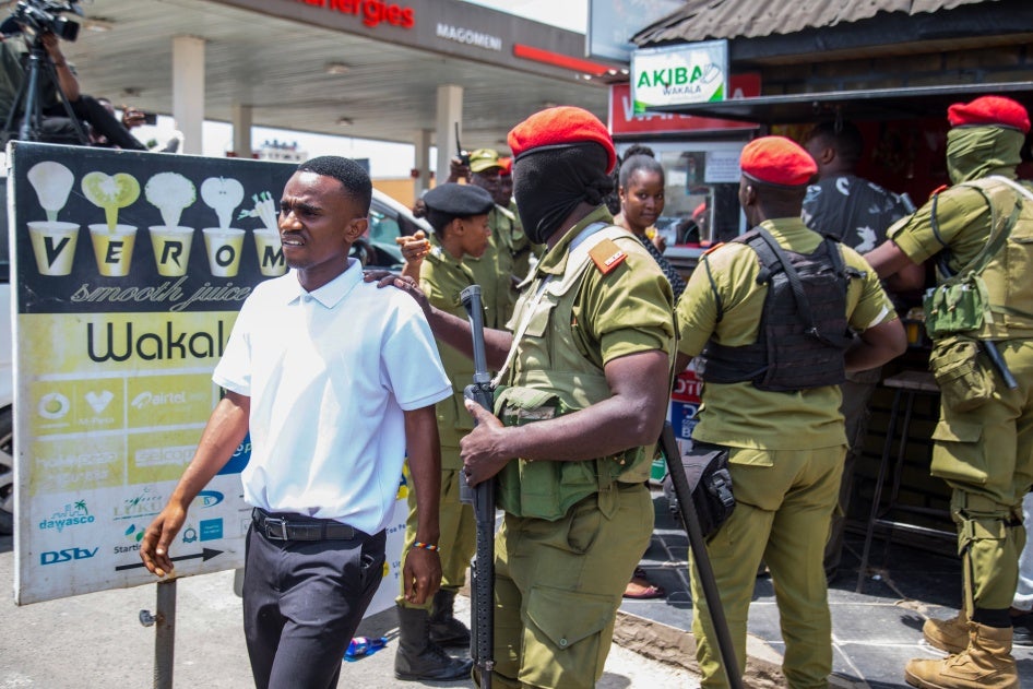Police detain a supporter of Tanzania’s main opposition party, Chadema, at the start of a banned protest in Dar es Salaam, September 23, 2024.
