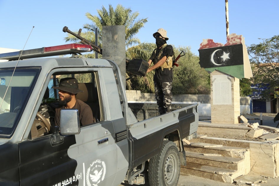 Libyan security forces stand guard in Tripoli, Libya, August 16, 2023. 