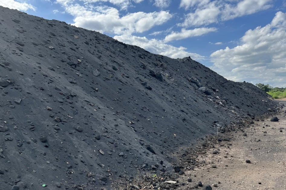 Lead waste pile near the former mine area by the roadside, Kabwe, Zambia, March 2024. 