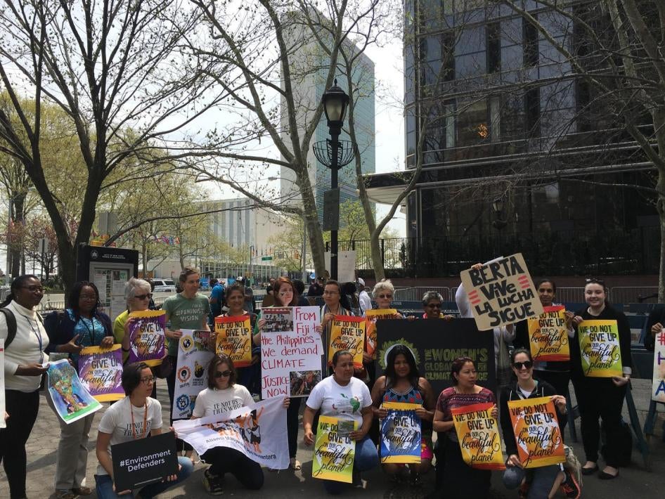 Women climate change activists demand respect for rights at Paris Agreement signing ceremony outside the United Nations in New York, April 2016.