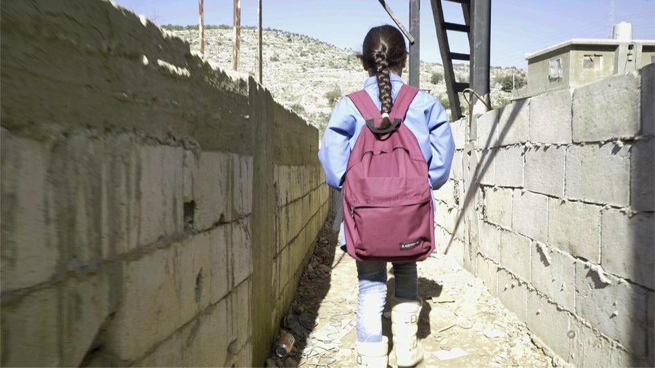 Bara’a, 10, originally from Ghouta, Syria, leaves for school from her informal refugee camp in Mount Lebanon.