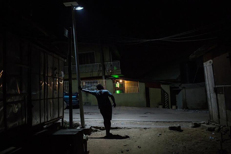 A gay man in Bariga, a neighborhood in Lagos, Nigeria, who said he hides his identity from his friends and family.