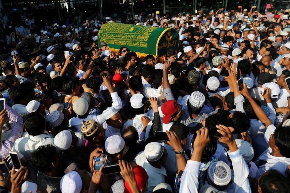 Supporters carry the coffin of U Ko Ni after he was shot and killed in Rangoon, Burma on January 30, 2017.