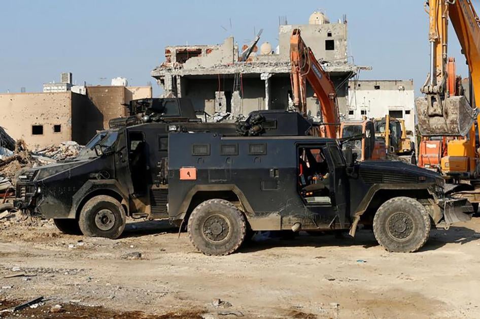 Vehicles belonging to Saudi forces are seen in the eastern town of Awamiya, following a security campaign against Shi'ite Muslim gunmen, August 9, 2017. 