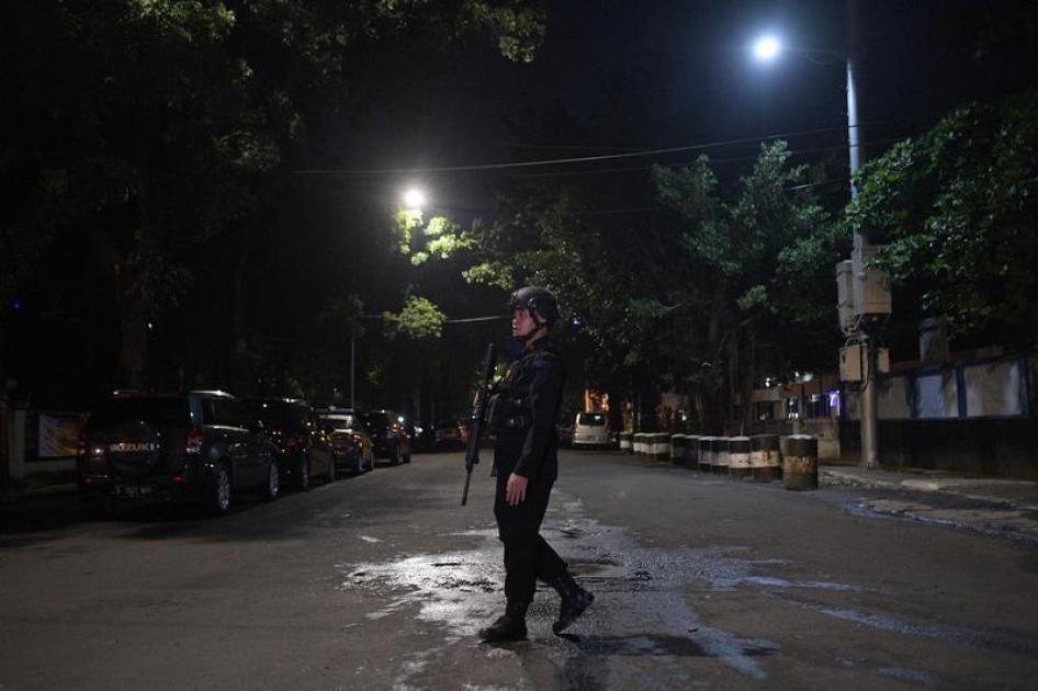 An officer from the police mobile brigade patrols in Jakarta, Indonesia, June 30, 2017.