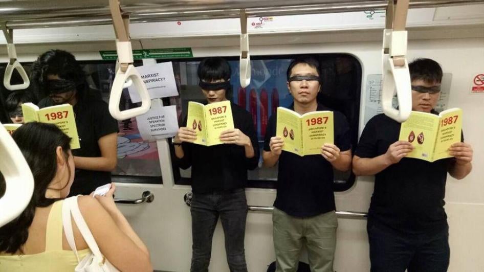 201711asia_singapore_jolovan Jolovan Wham participates in a silent protest with eight other activists on an MRT train in Singapore, June 3, 2017. 
