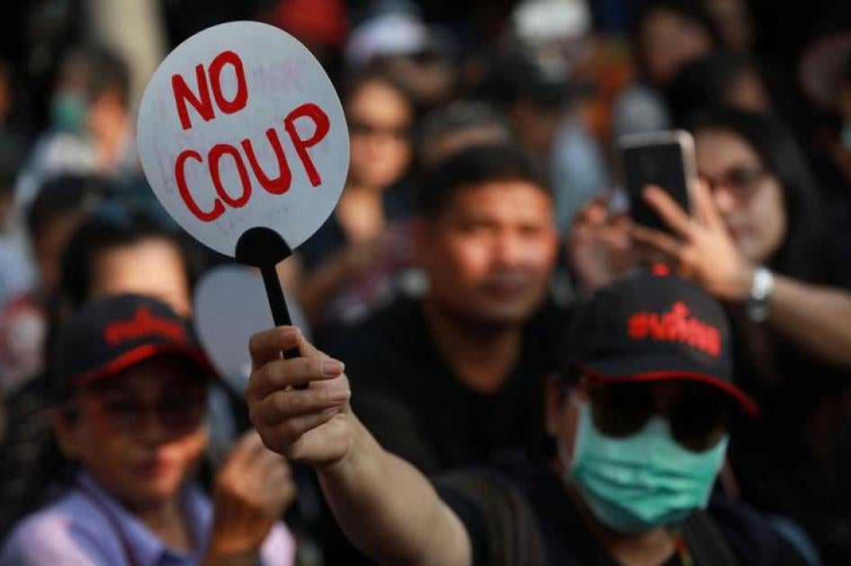 A Pro-democracy activist holds a fan during protest against junta near Democracy Monument in Bangkok, Thailand February 10, 2018. REUTERS/Soe Zeya Tun