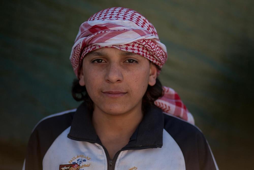 Fahd, 15, originally from Syria, is not in school. Instead, he works in construction in the Bekaa Valley. 