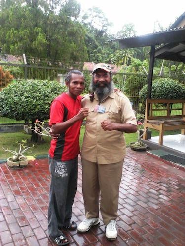 Romanus Batseran and Filep Karma.