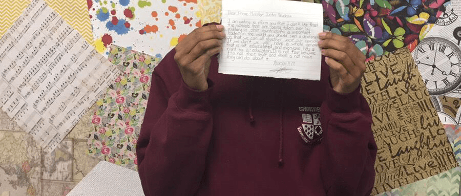 Canadian students taking part in an exercise to urge Justin Trudeau to sign the Safe Schools Declaration and help end attacks on and military use of schools.