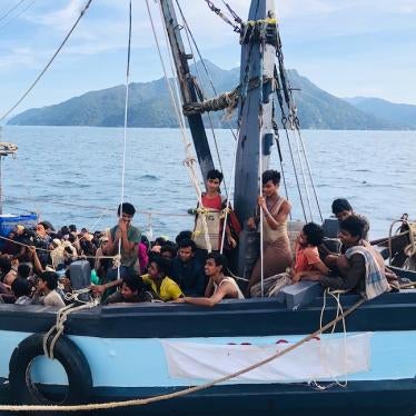 A boat carries Rohingya refugees off the coast of Langkawi, Malaysia, April 5, 2020.