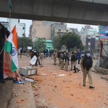 Police stand guard during a protest against a new citizenship law at the Seelampur area of New Delhi, India, February 20, 2020. 