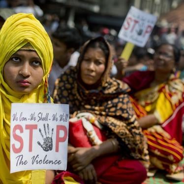 Bangladeshi women hold placards during a rally to mark the International Women's Day in Dhaka, Bangladesh.