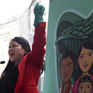 Marcelina Bautista, leader of Centro de Apoyo y Capacitación para Empleadas del Hogar, a domestic workers organization, celebrates the beginning of a pilot program extending access to social security and healthcare benefits for domestic workers, Mexico City, Mexico. 
