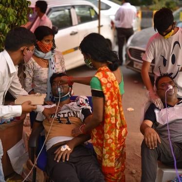 People suffering from breathing problems receive free oxygen support at a gurdwara, a place of assembly and worship for Sikhs, amidst the spread of the coronavirus disease, in Delhi, India. 