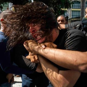 Plainclothes officers detain a protester during a protest in Havana, Cuba, Sunday, July 11, 2021. 