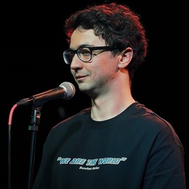 Idrak Mirzalizade Comedian Performing Stand-up