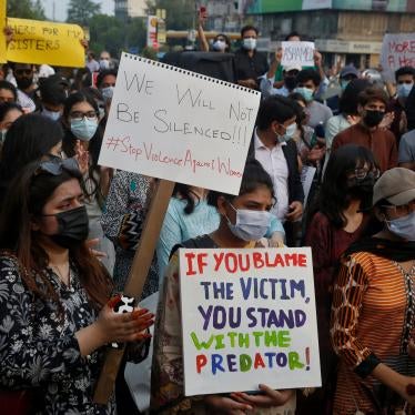 Women's rights activists demonstrate to condemn violence against women in Lahore, Pakistan