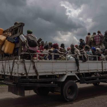 A truck full of people cut off from traffic during clashes between the Congolese army and M23 rebels in Kibumba, on the outskirts of Goma in North Kivu, Democratic Republic of Congo, June 1, 2022.