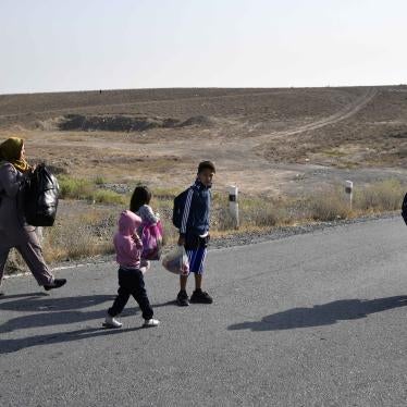 People walking along a road 