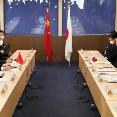 Japanese Foreign Ministry's senior official Shigeo Yamada, second right, speaks to Chinese counterpart Sun Weidong, second left, during the Japan-China security dialogue at the Foreign Ministry in Tokyo.