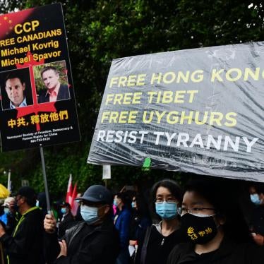 People attend a vigil commemorating the 32nd anniversary of the 1989 Tiananmen Square democracy protests and crackdown outside of the Chinese consulate in Vancouver, Canada, June 4, 2021.