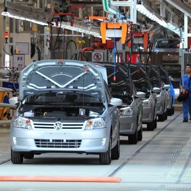 Cars pass through the assembly line at the Xinjiang auto plant of Shanghai Volkswagen in Urumqi, northwest Chinas Xinjiang Uyghur Autonomous Region, August 29, 2013.