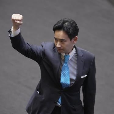 Pita Limjaroenrat, the leader of the Move Forward Party and top winner in May's general election, raises his hand as he leaves Parliament in Bangkok, Thailand, July 19, 2023.