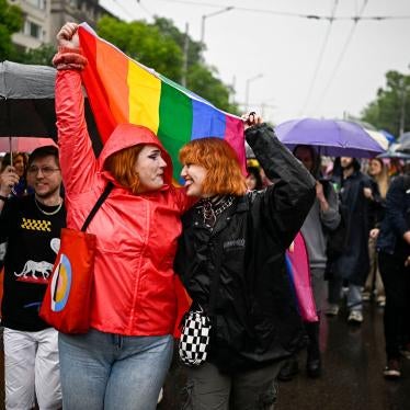 Participants hold a LGBTQI flag as they take part in the annual Gay Pride Parade in downtown Sofia, Bulgaria on June 17, 2023.