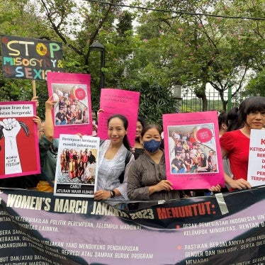 Demonstrators for women's rights demand that the government revoke mandatory hijab regulations, Jakarta, Indonesia, May 2023.