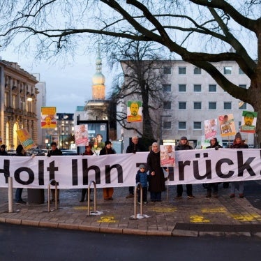 A vigil on 18 January 2024 in Dortmund, Germany, on the anniversary of the deportation of Tajikistan opposition activist Abdullohi Shamsiddin. The banner reads: ‘Bring Him Back!’